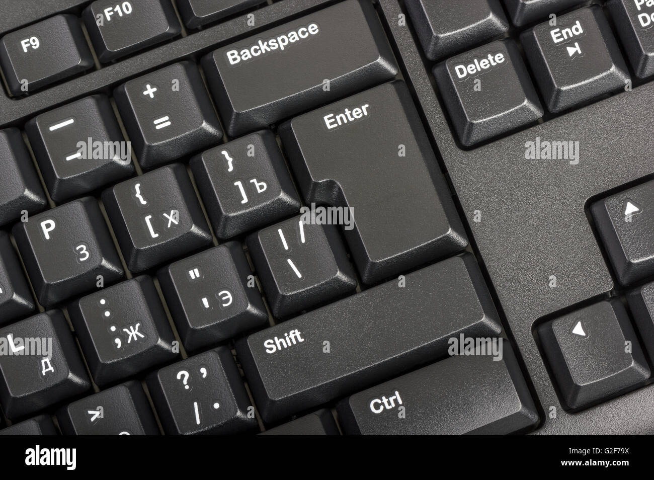 Electronic collection - close-up black computer keyboard with russian letter and key enter Stock Photo