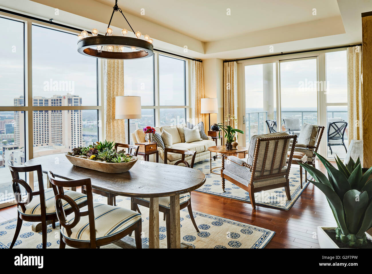 Traditional Living and Dining Rooms in High-Rise Condominium Stock Photo