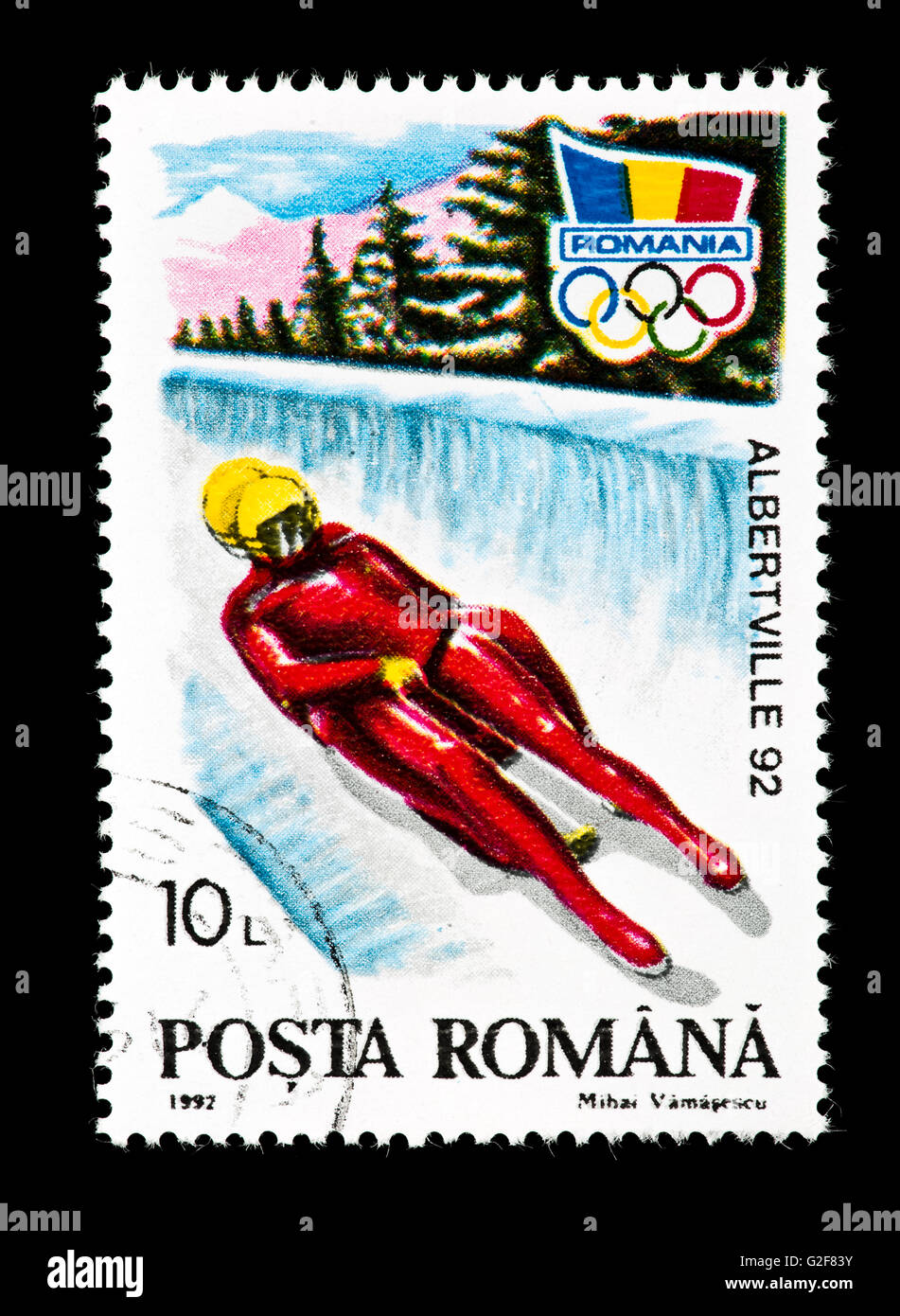 Postage stamp from Romania depicting a luger on a track, issued for the 1992 Winter Olympic Games in Albertville, France. Stock Photo