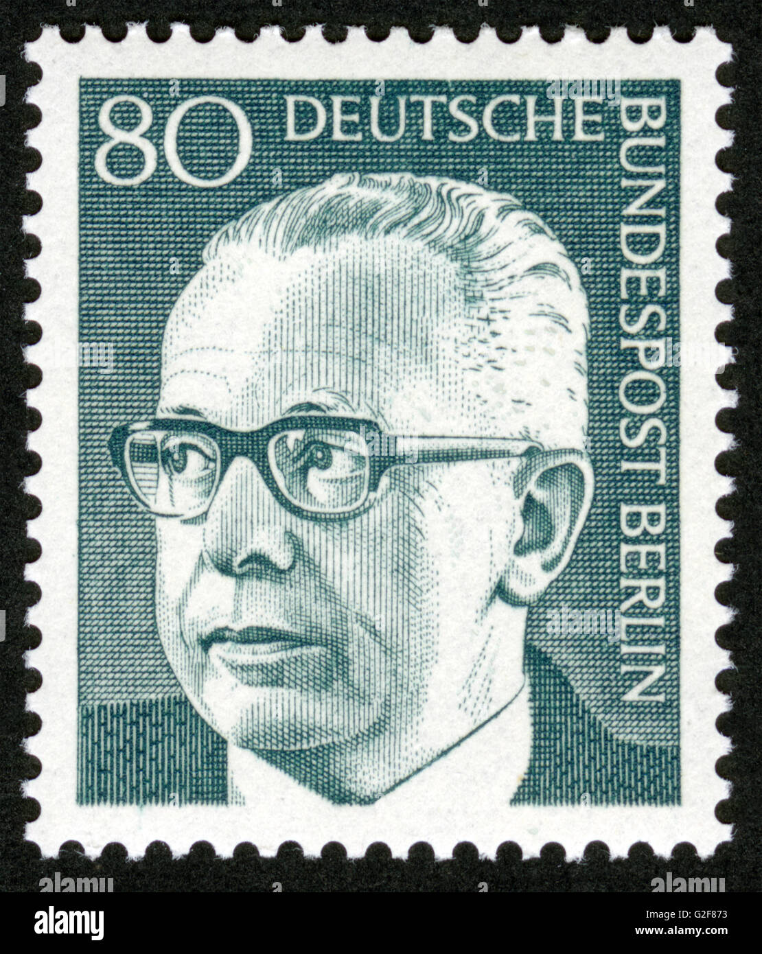 GERMANY - CIRCA 1971 A stamp printed in Germany showing a portrait of Federal President Gustav Walter Heinemann, circa 1971 Stock Photo