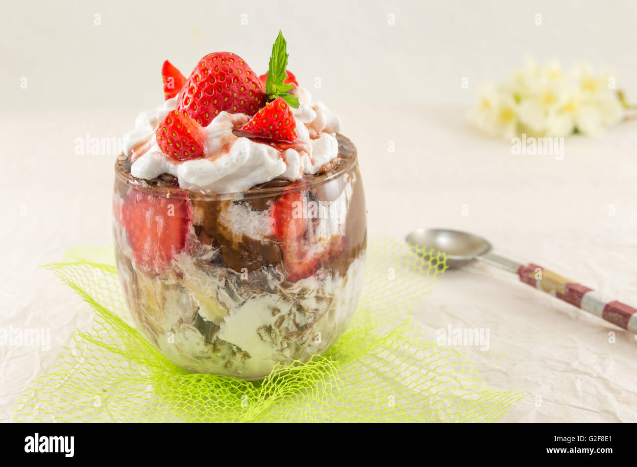 Strawberry parfait in a glass and fresh strawberries Stock Photo