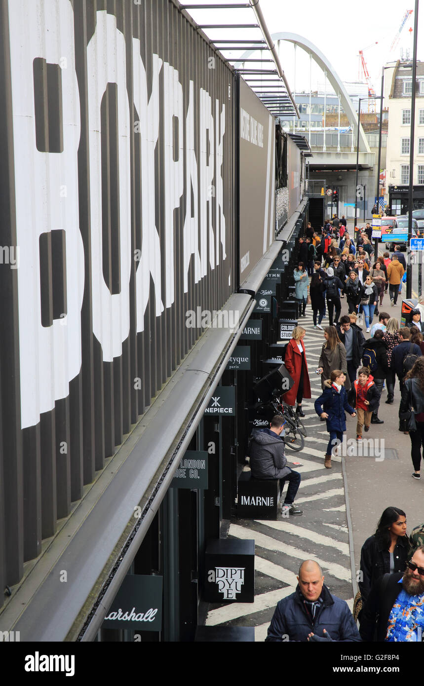Boxpark in trendy Shoreditch, east London, a shipping container popup mall, with fashion and