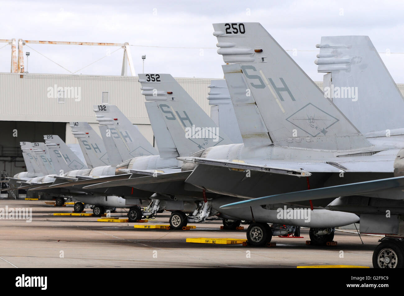 Row of U.S. Marine Corps F/A-18 Hornet tail fins from VMFAT-101, on the ramp at Marine Corps Air Station Miramar, San Diego, Cal Stock Photo