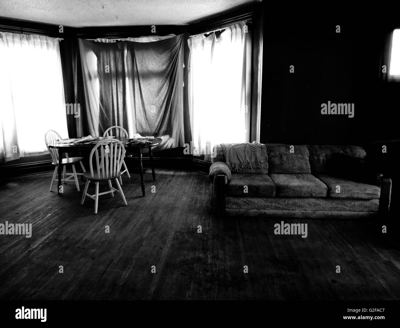 Living Room in Rundown House Stock Photo