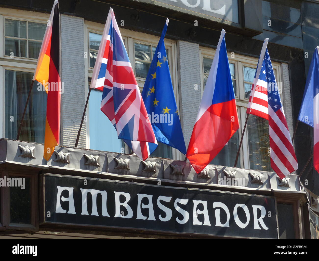 Prague, Hotel Ambassador, Union Jack, German flag, EU flag, Czech national flag, US fag, French flag, 5 star hotel, five star Stock Photo