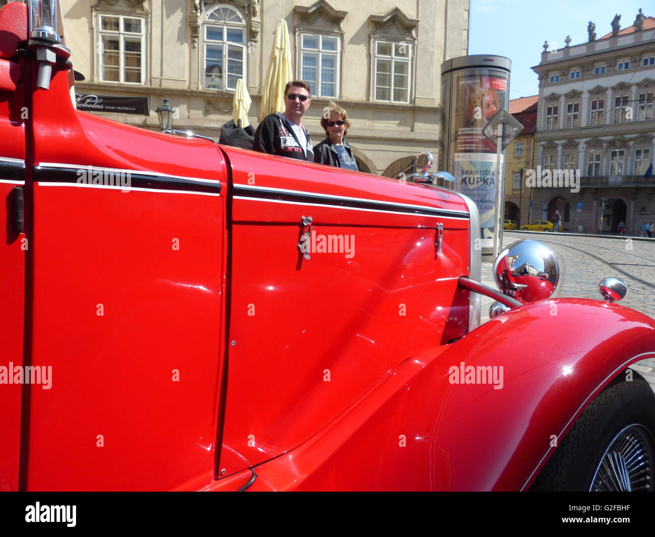 Vintage car used to bring tourist to sightseeing trip around Prague