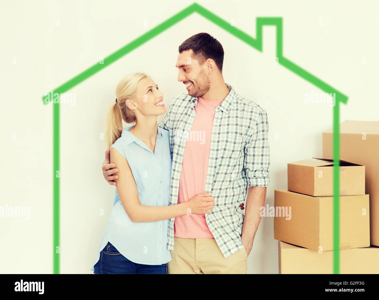 couple with cardboard boxes moving to new home Stock Photo - Alamy