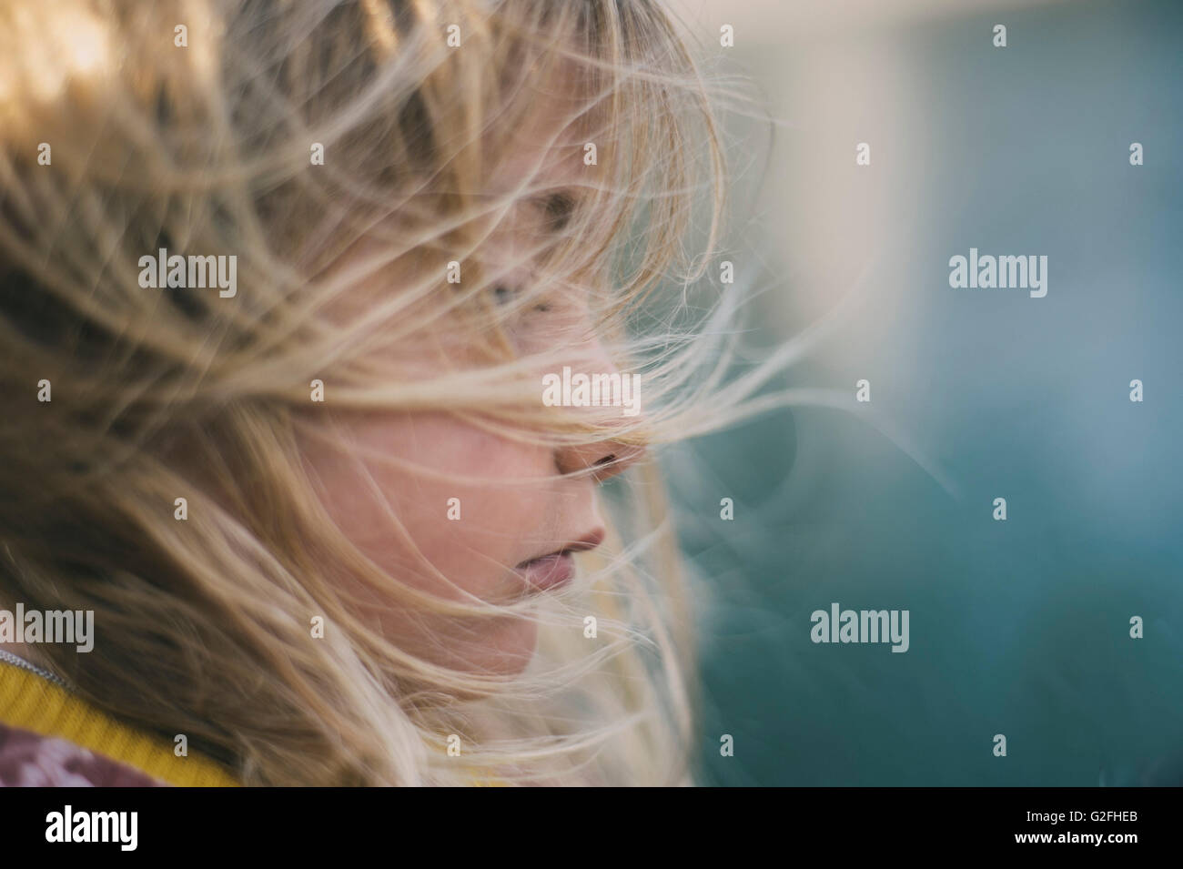 Young Girl with Windblown Hair Stock Photo