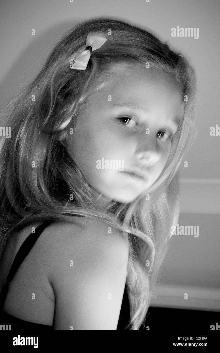 Blurred Young Girl With Blonde Hair, Portrait Stock Photo