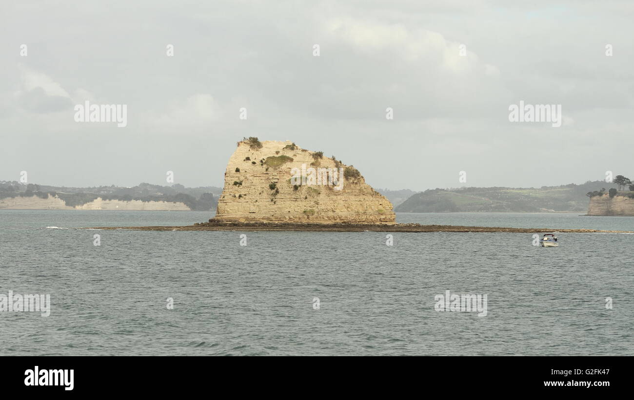 An isolated rock off the Gulf Harbour, Whangaparoa, Auckland, New ...