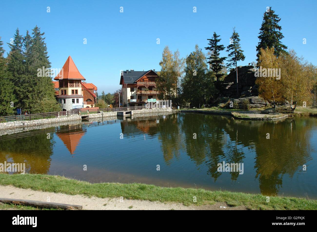 Szklarska Poreba, Poland - October 4, 2014: Small pond nearby chairlift in Szklarska Poreba resort in Karkonosze mountains in Po Stock Photo