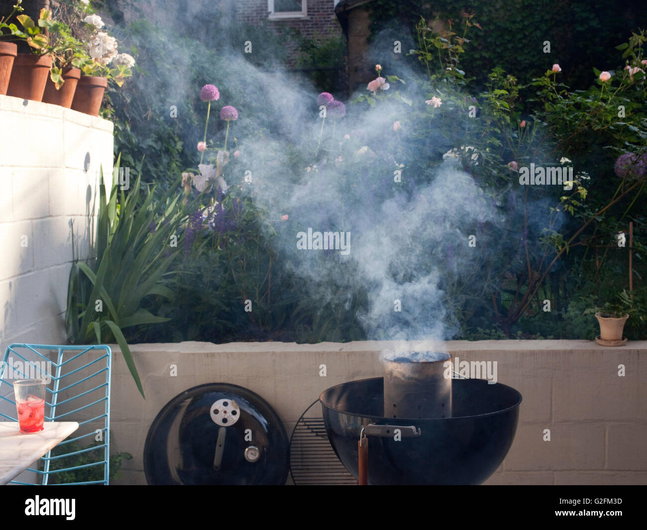smoking barbecue in porch Stock Photo