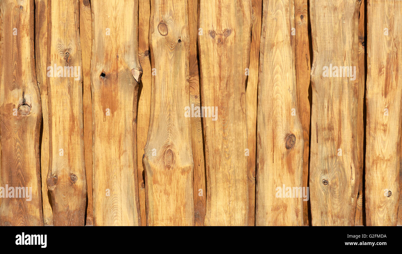 Wooden fence background texture. Closeup wall of wood planks. Stock Photo