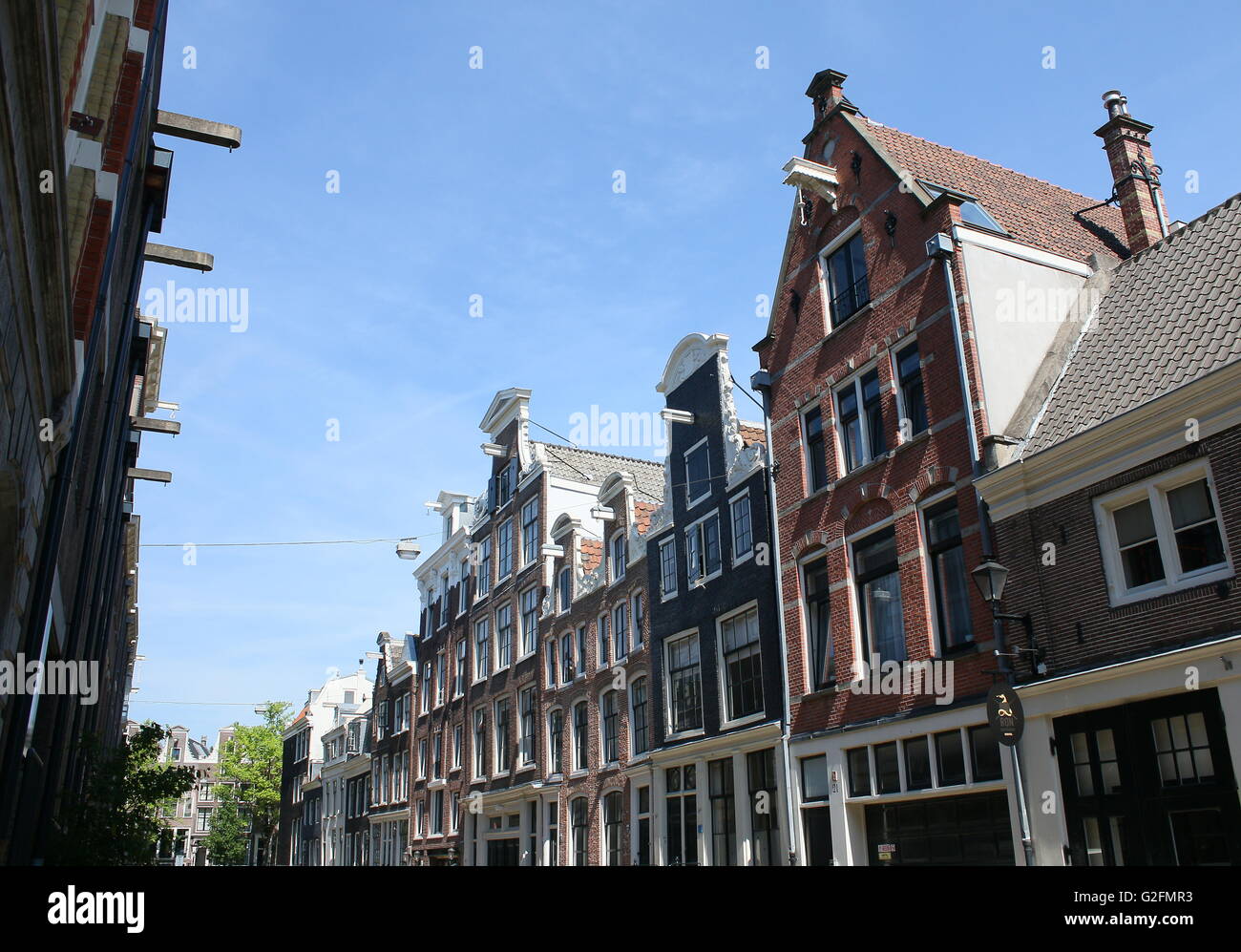 Different styles of old 17th & 18th century gables along Kerkstraat, just off Leidseplein square, central Amsterdam, Netherlands Stock Photo