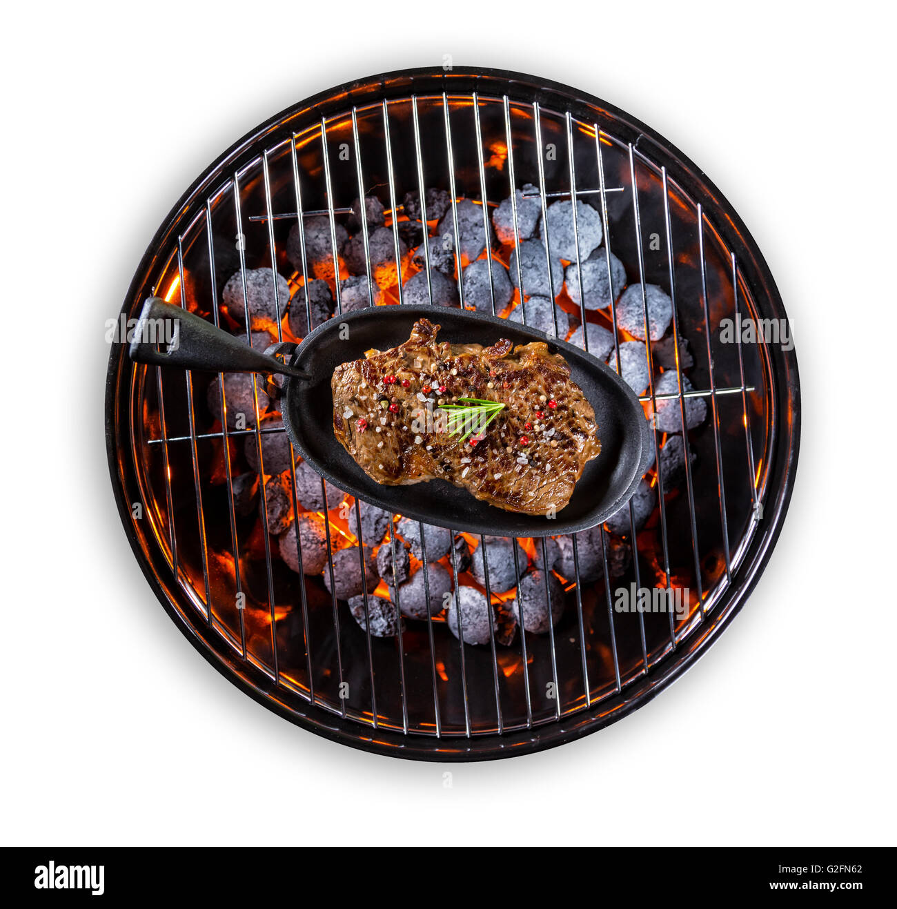 https://c8.alamy.com/comp/G2FN62/beef-steak-in-pan-served-on-grill-isolated-on-white-background-G2FN62.jpg