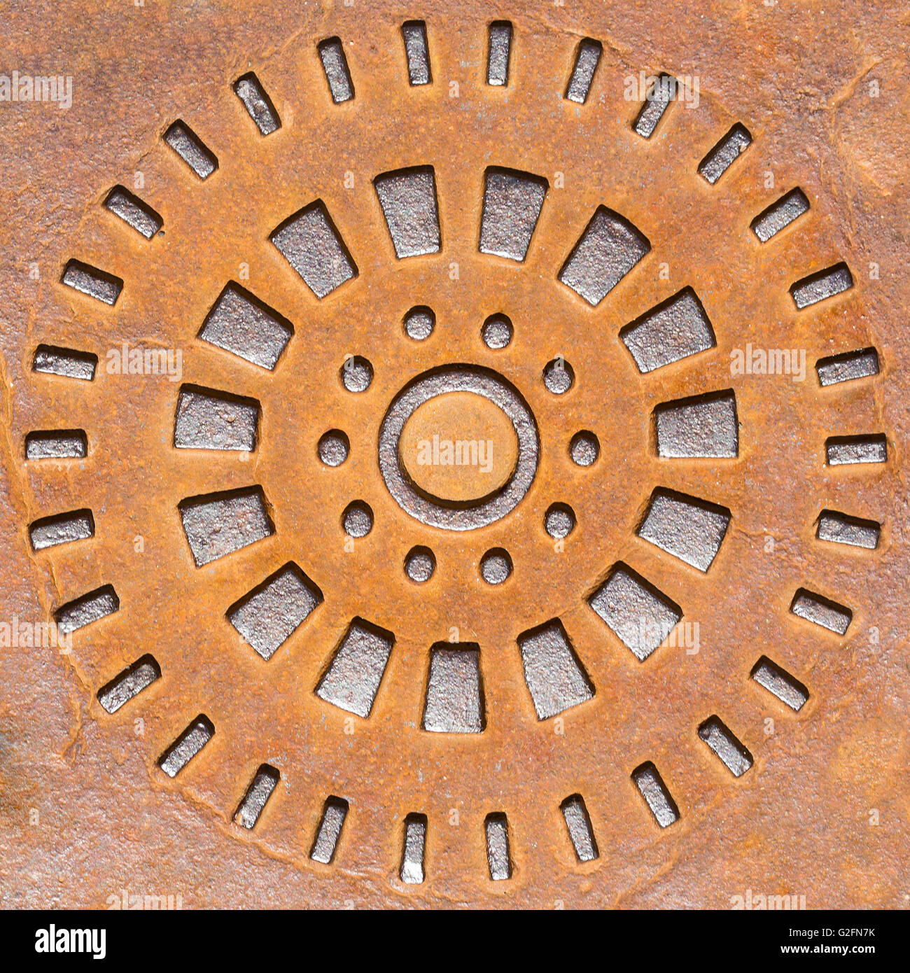 Close-up of abstract rusty round object background Stock Photo