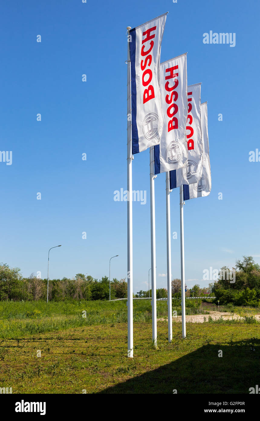 Flags with emblem Bosch against the blue sky Stock Photo - Alamy