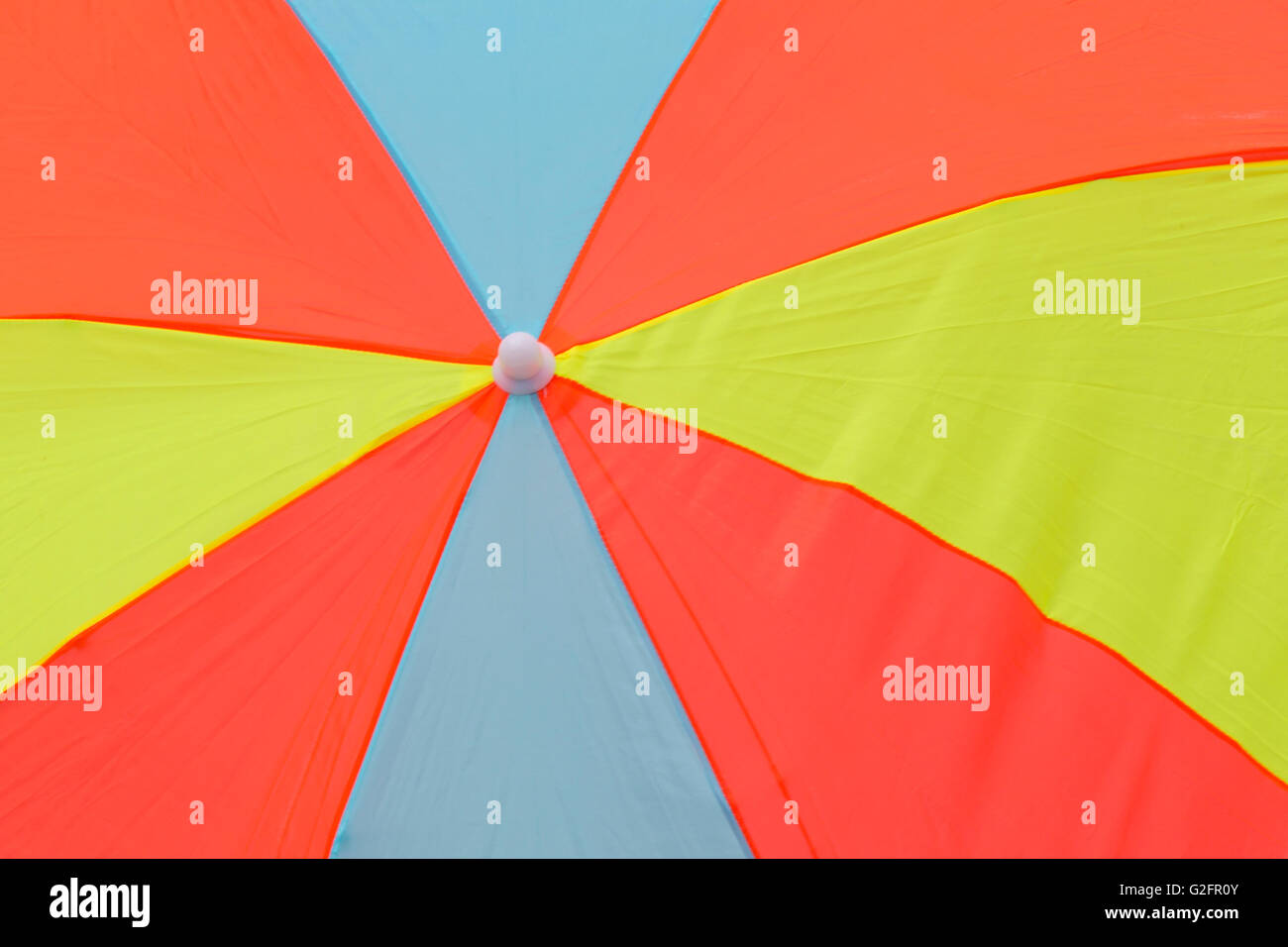 Close-up of top of colorful bright beach umbrella Stock Photo