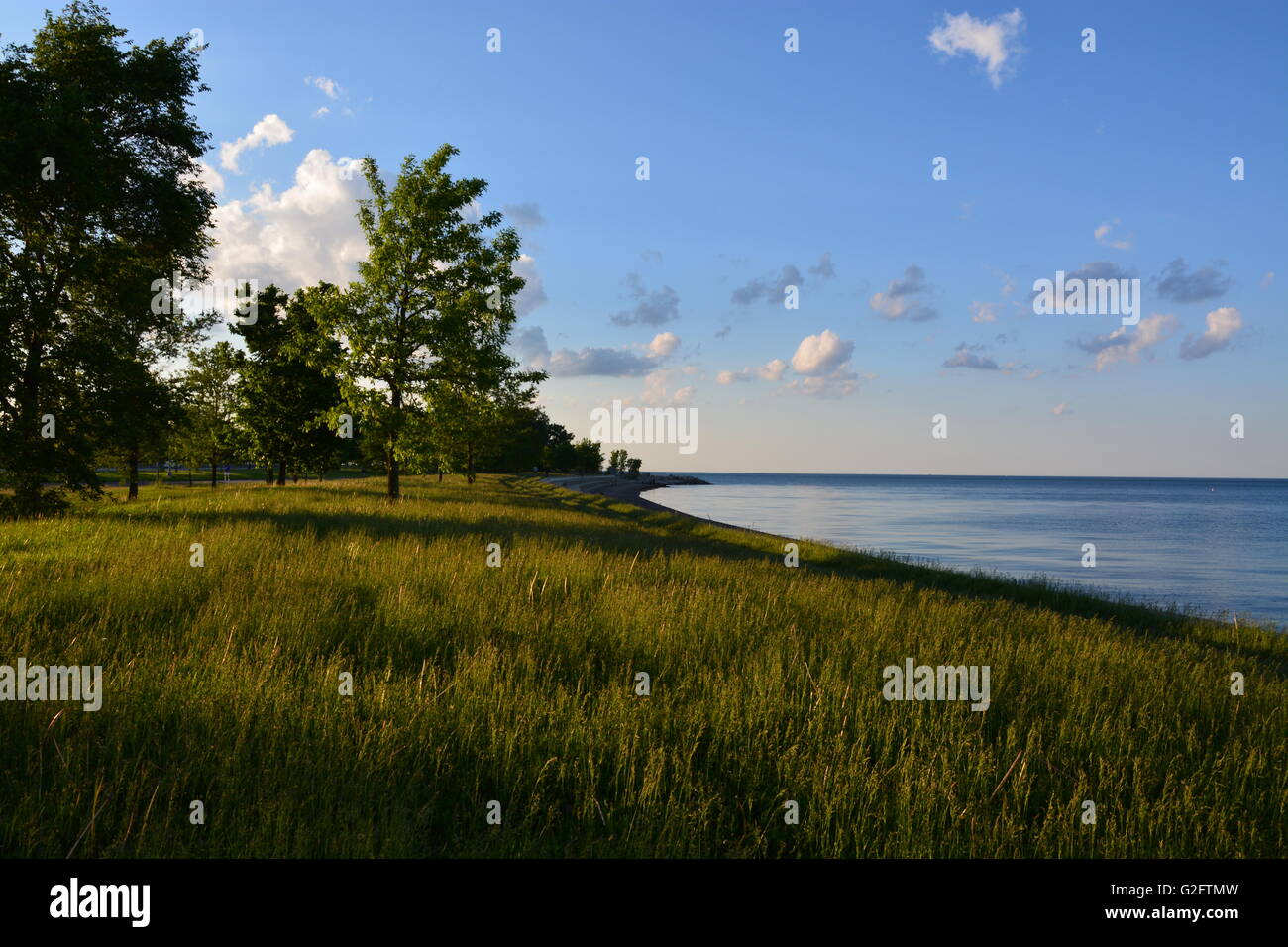 Lake Michigan shoreline park at sunset from the Hyde Park neighborhood on Chicago's south side. Stock Photo