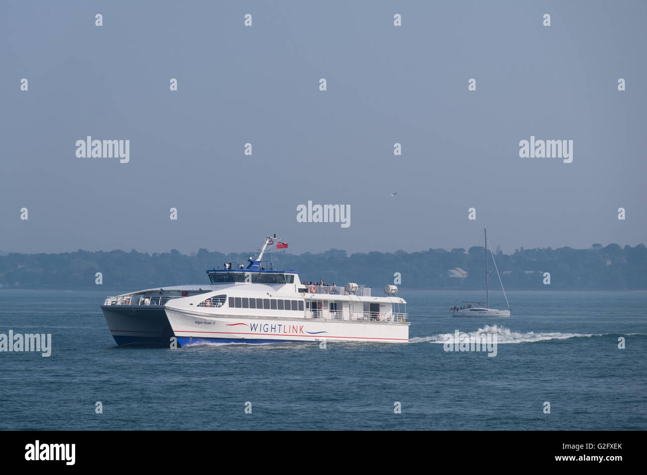 The Wightlink passenger ferry Wight Ryder 2 in the Solent on her way from Ryde Pier Head to Portsmouth Stock Photo