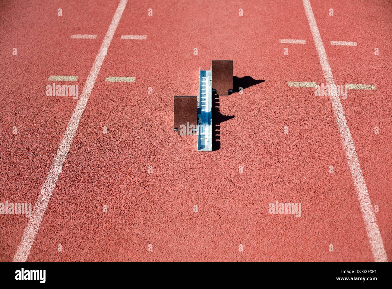 Starting block on a running track Stock Photo Alamy