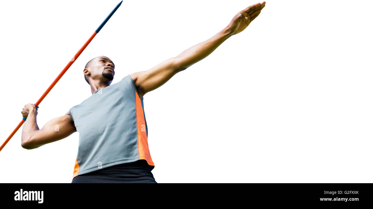Low angle view of sportsman practising javelin throw Stock Photo