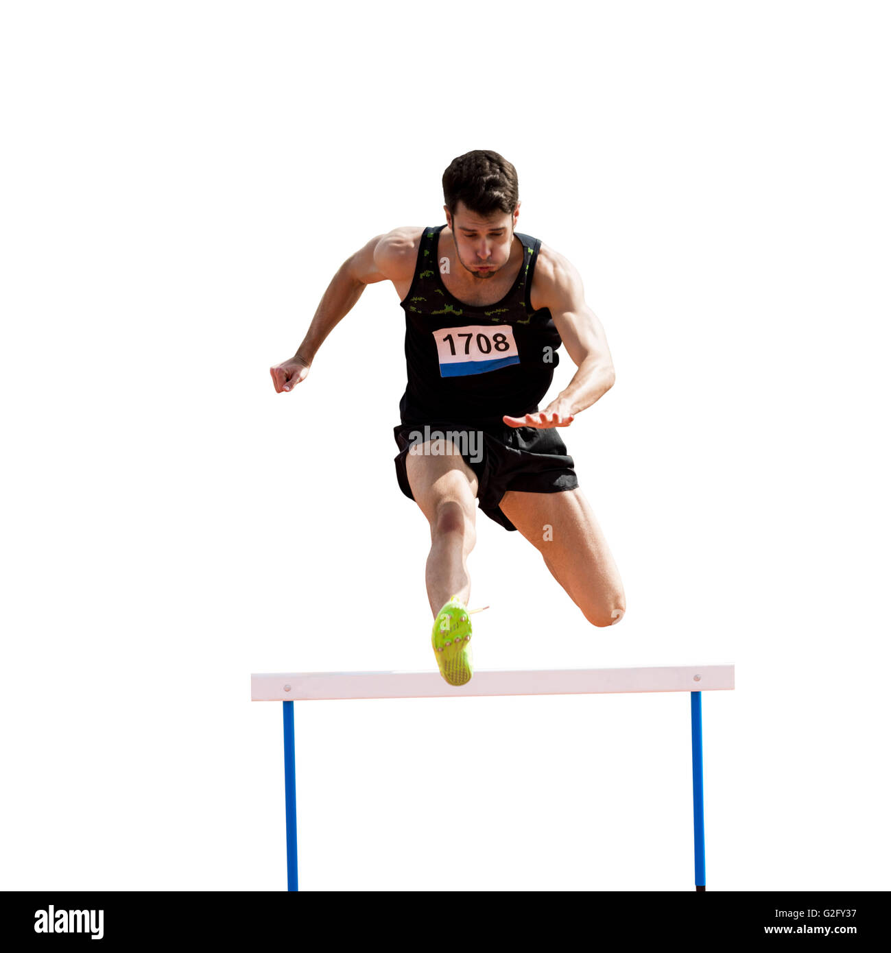 Sportsman practicing hurdles Stock Photo