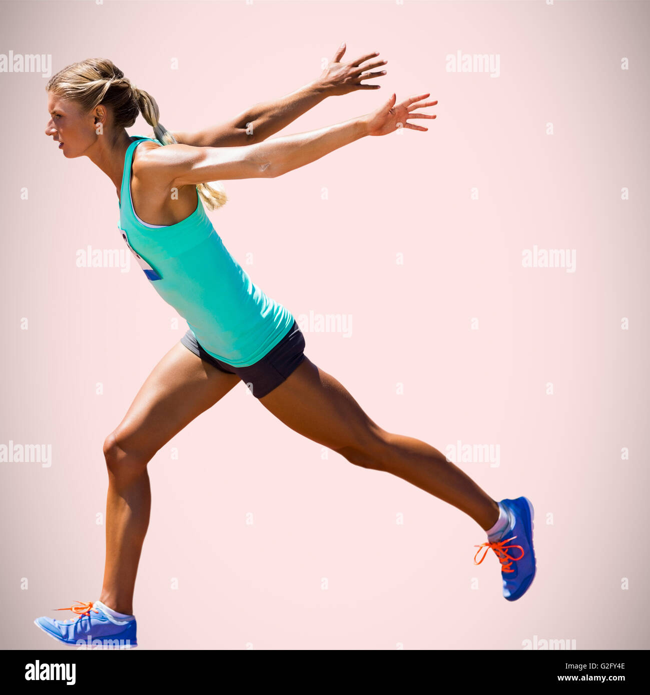 Composite image of sportswoman finishing her run Stock Photo