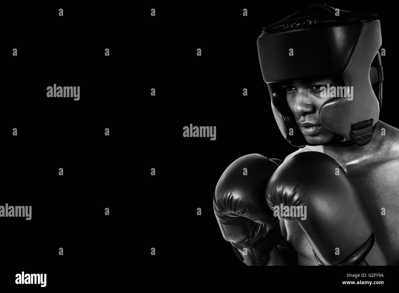 Composite image of boxer performing boxing stance Stock Photo