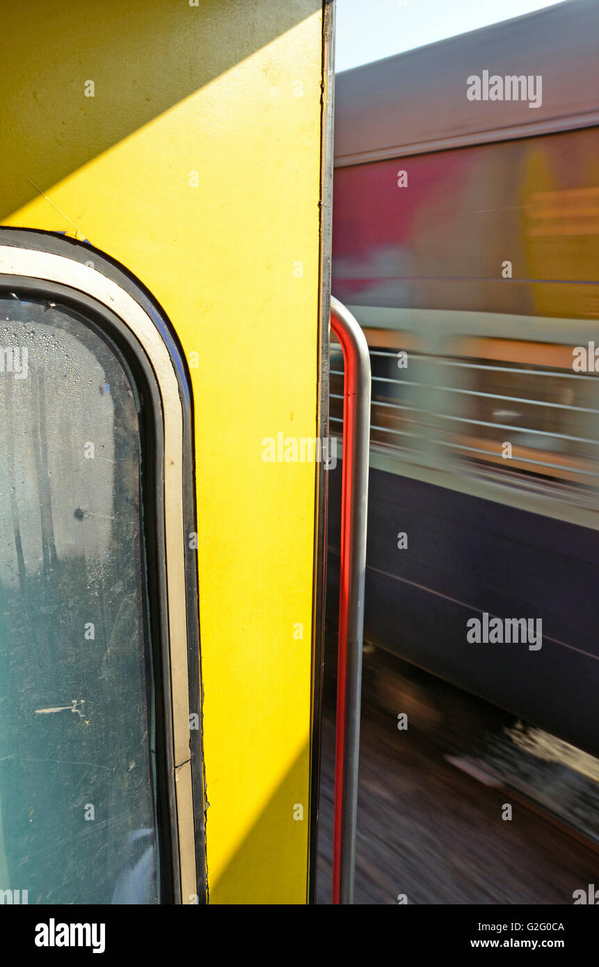 Indian countryside as viewed from the footboard of a running train