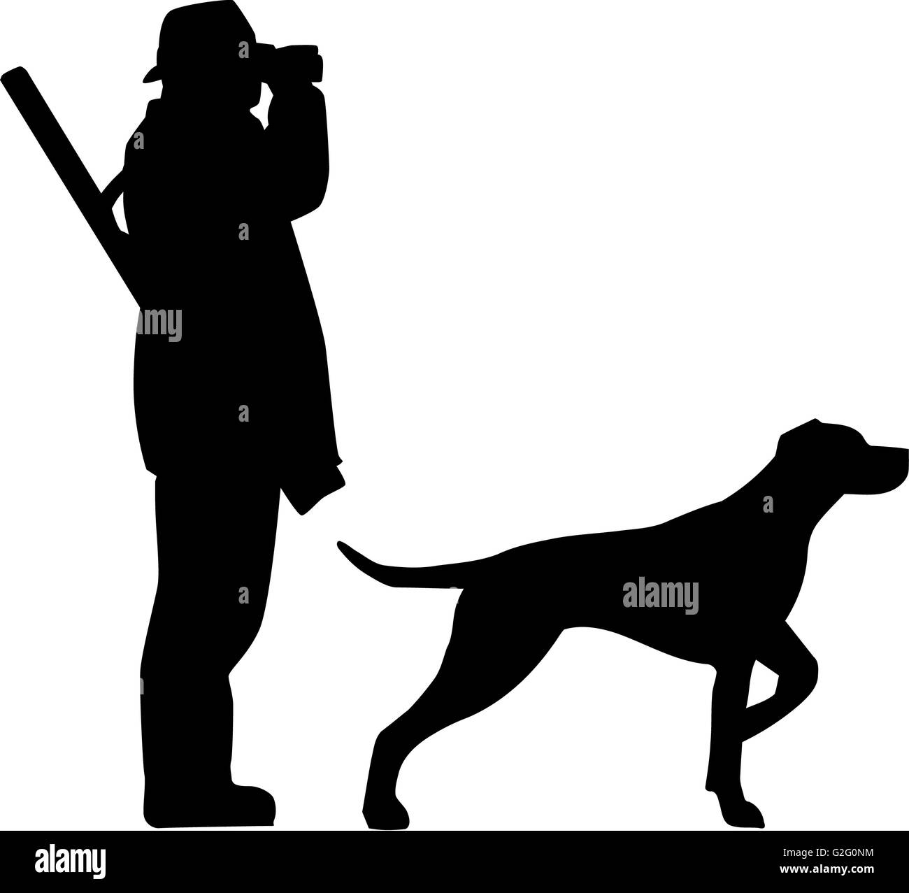 Hunter with field glasses and dog Stock Photo