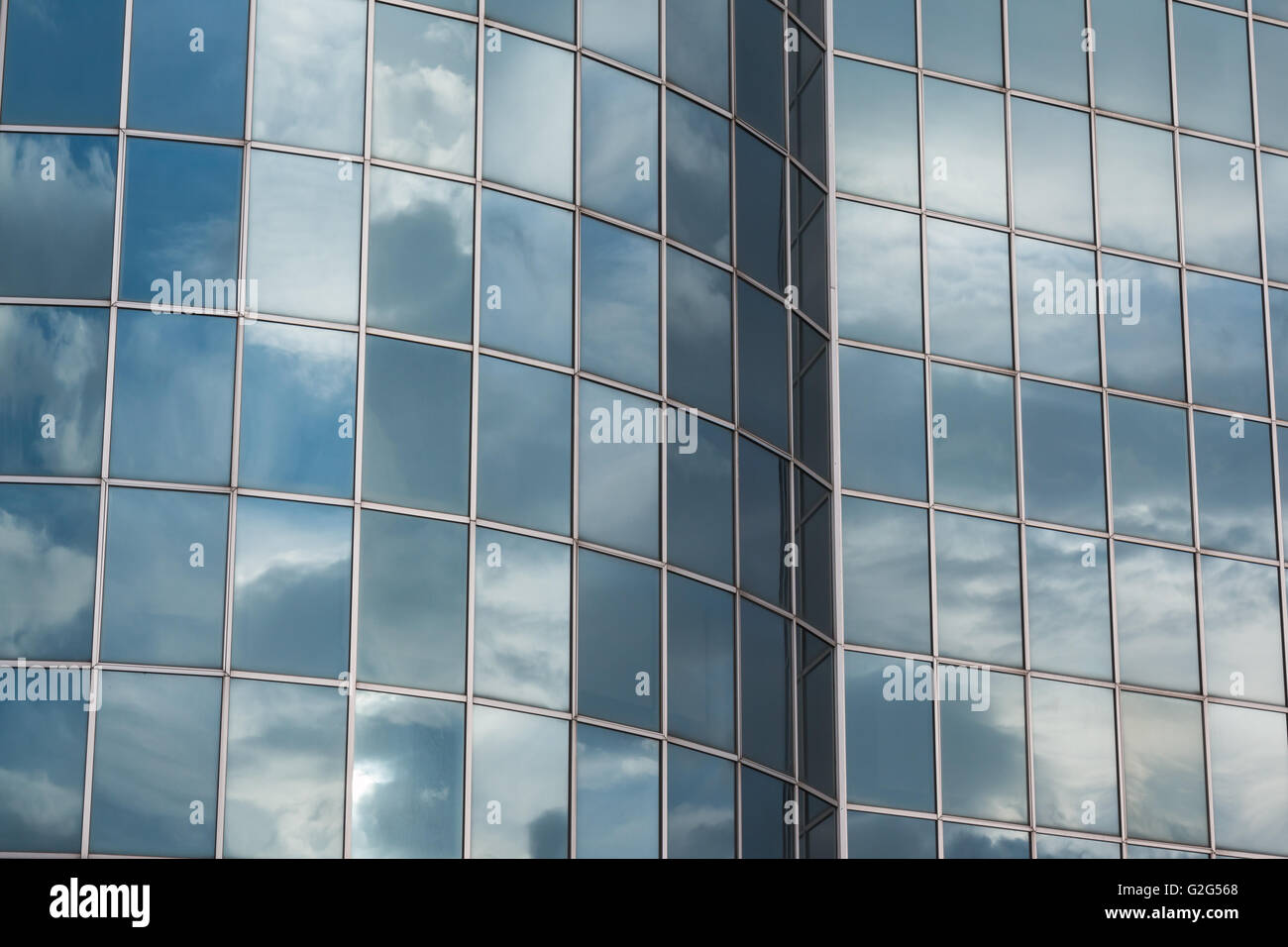Blue Sky and Clouds Reflected in the Glass Building Stock Photo - Alamy
