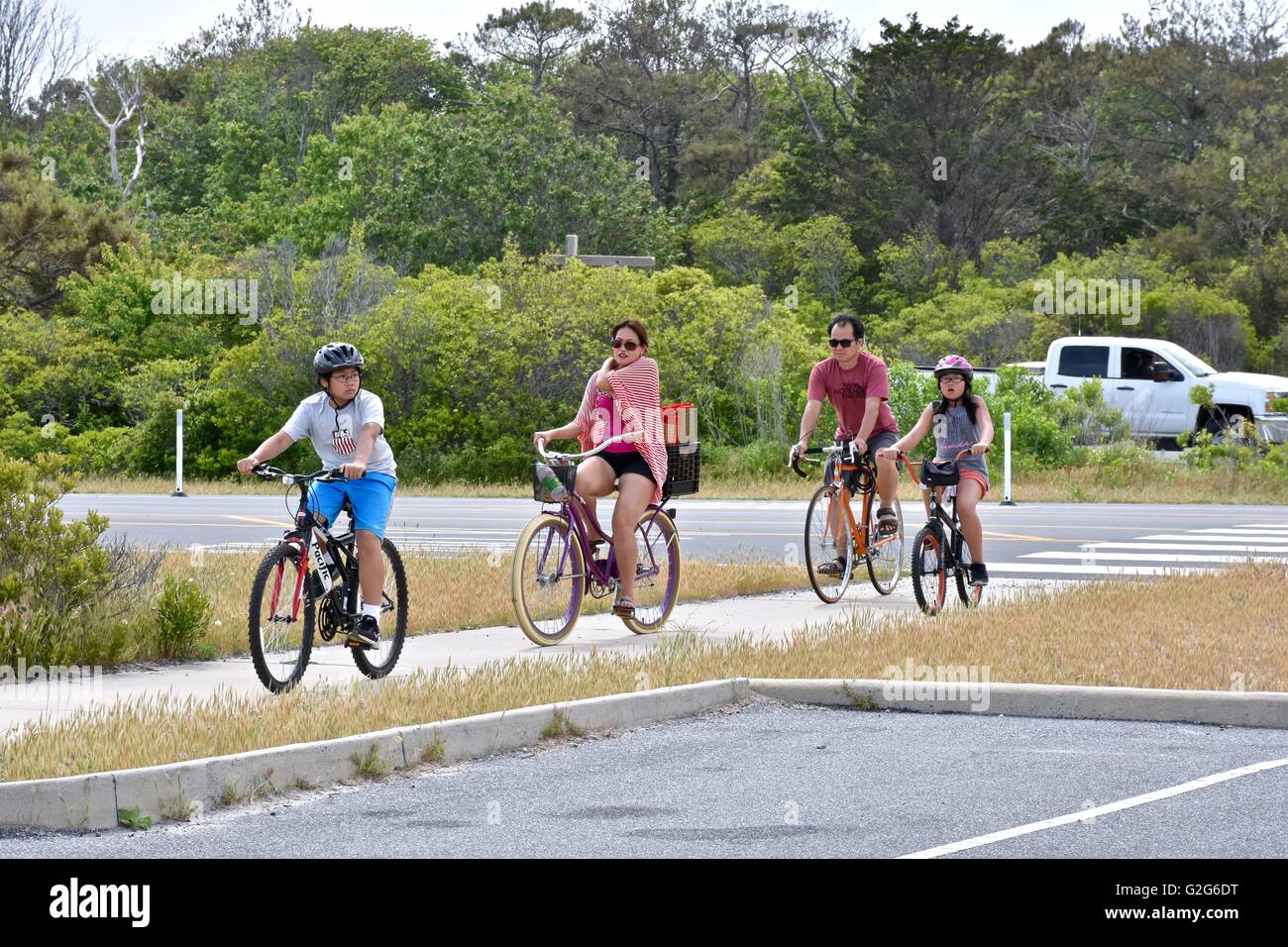 A family riding bikes Stock Photo