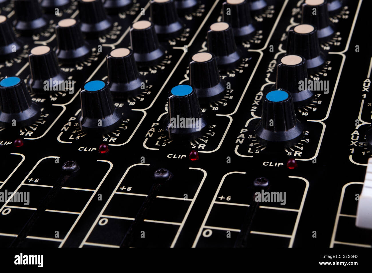 Analog studio sound mixer closeup with colored knobs Stock Photo Alamy