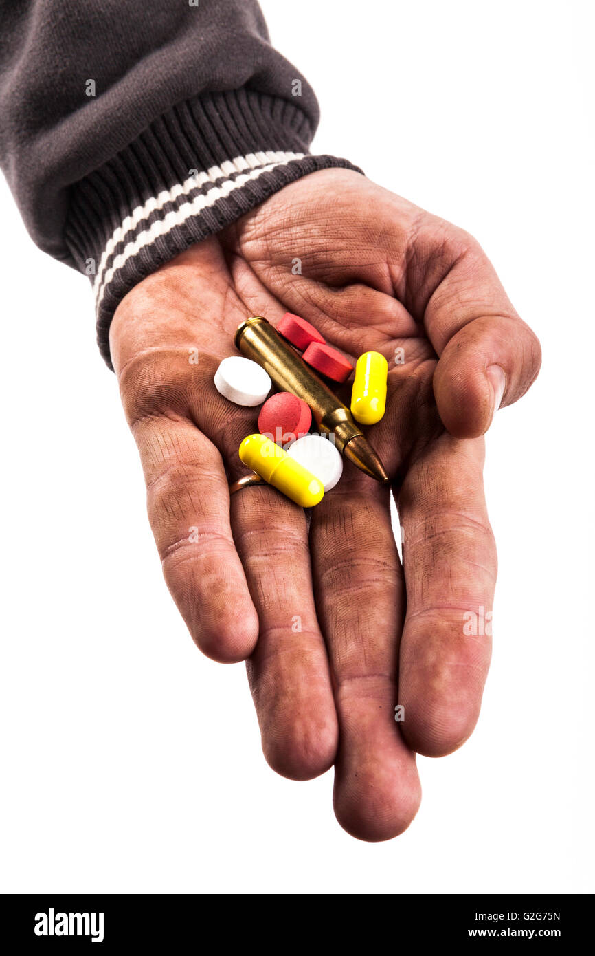 dirty human hand holding pills and bullet isolated on white background Stock Photo Alamy