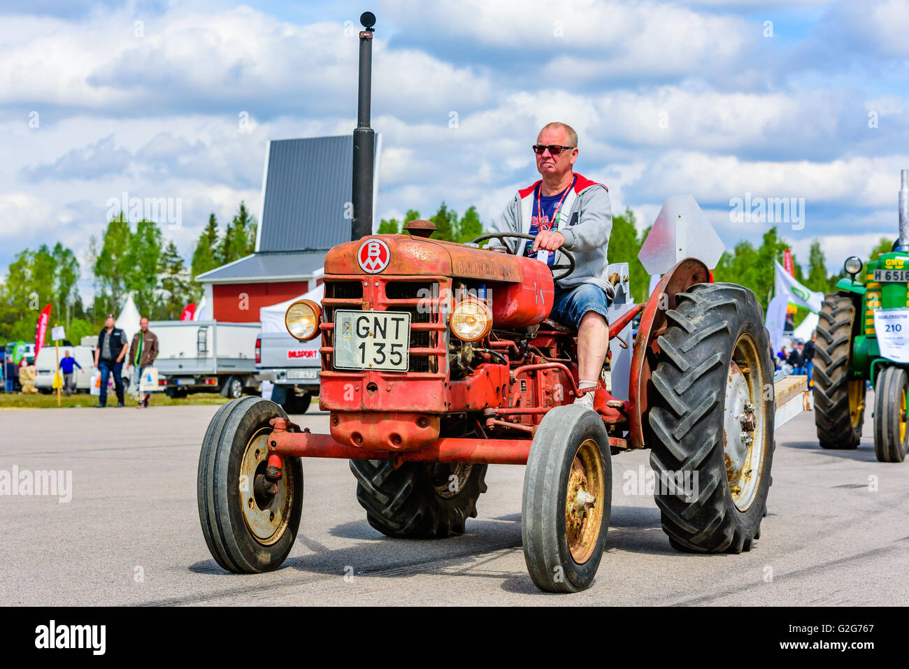 Emmaboda, Sweden - May 14, 2016: Forest and tractor (Skog och traktor) fair. Vintage classic tractors on parade. Here a red BM 4 Stock Photo