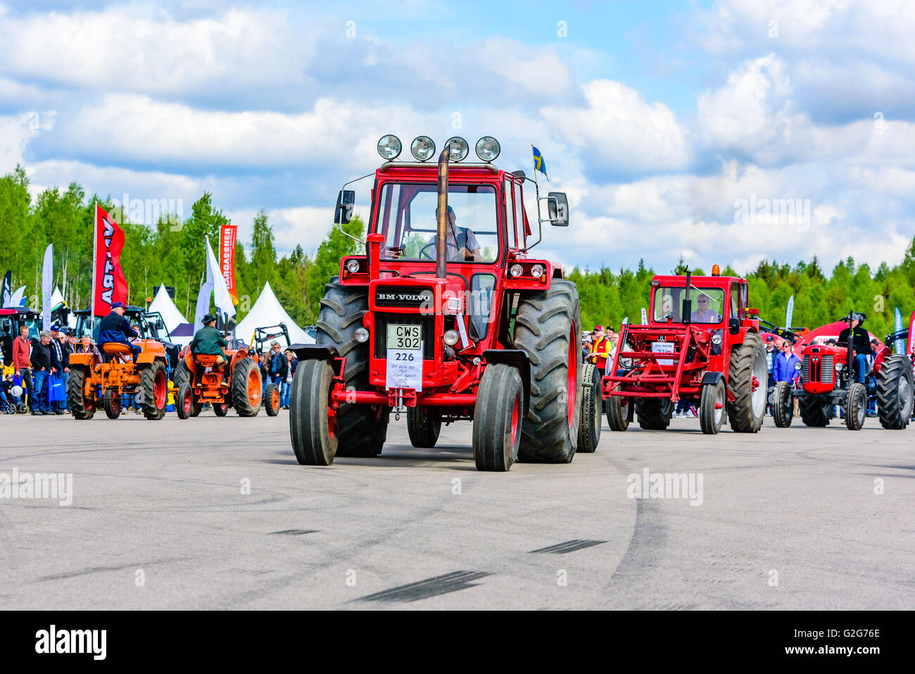 Emmaboda, Sweden - May 14, 2016: Forest and tractor (Skog och traktor) fair. Vintage classic tractors on parade. Here a red 1967 Stock Photo