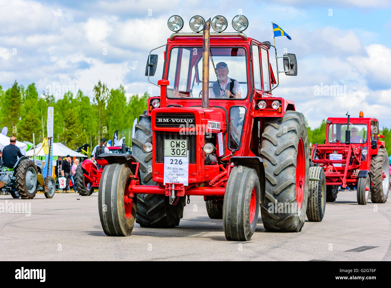 Emmaboda, Sweden - May 14, 2016: Forest and tractor (Skog och traktor) fair. Vintage classic tractors on parade. Here a red 1967 Stock Photo