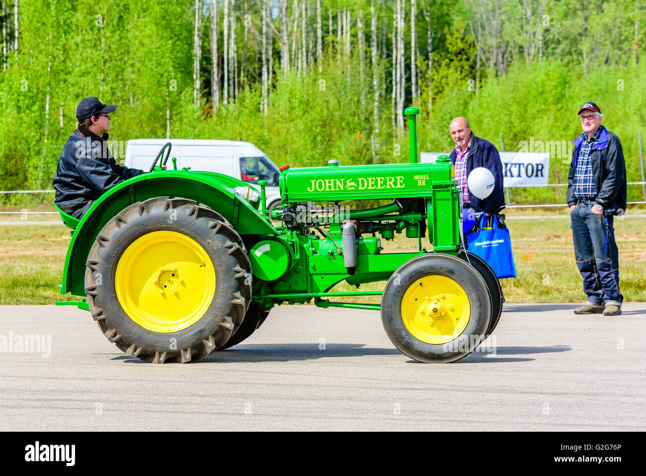Emmaboda, Sweden - May 14, 2016: Forest and tractor (Skog och traktor) fair. Vintage classic tractors on parade. Here a green 19 Stock Photo
