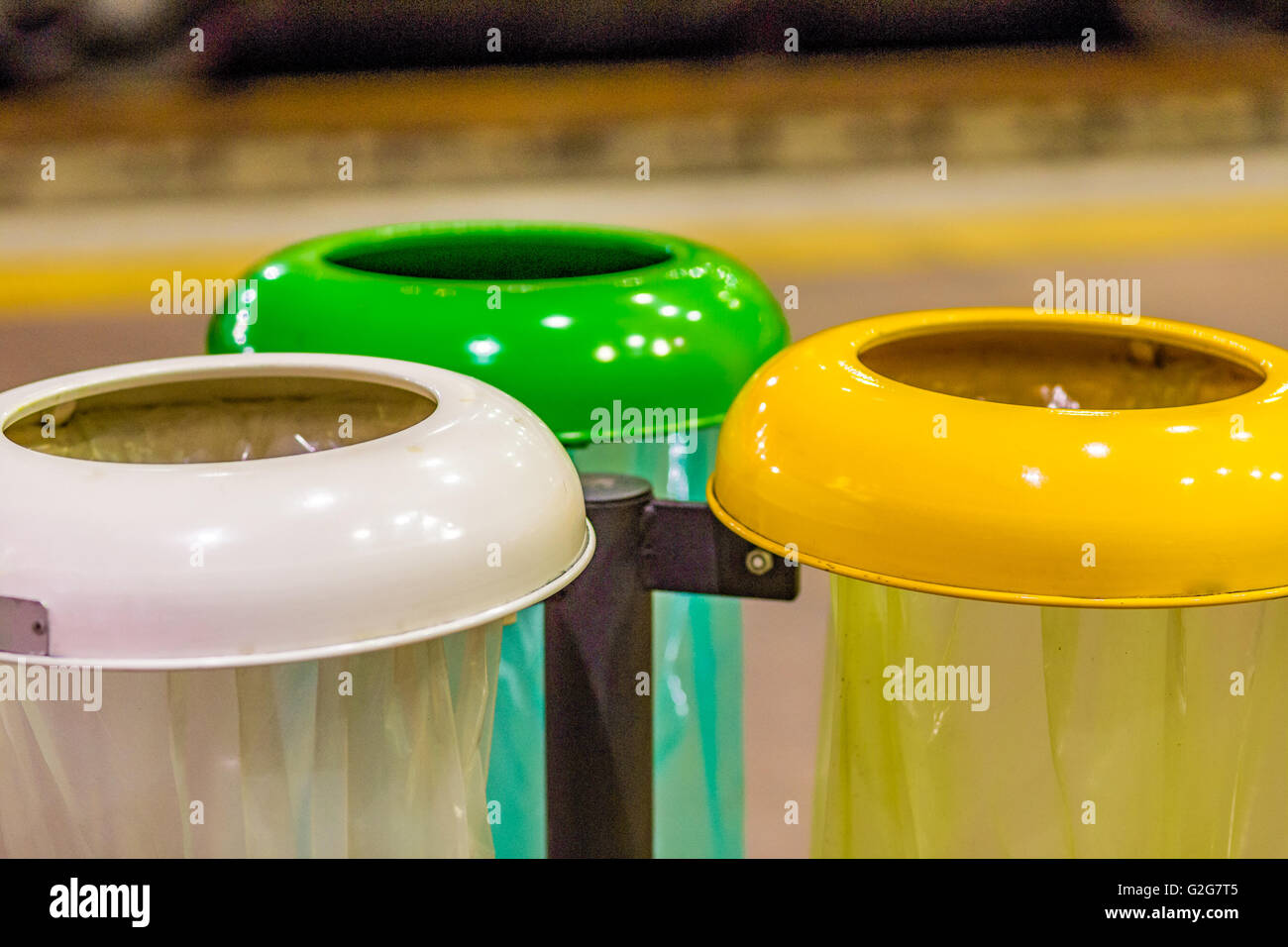 separate collection of waste, yellow container for plastic, white for