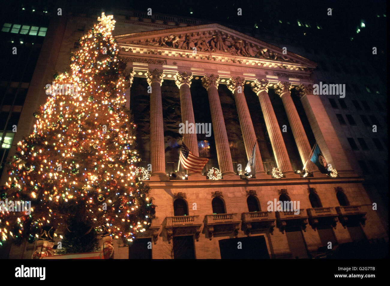 A Christmas Tree adorns the New York Stock Exchange building in Manhattan. Stock Photo