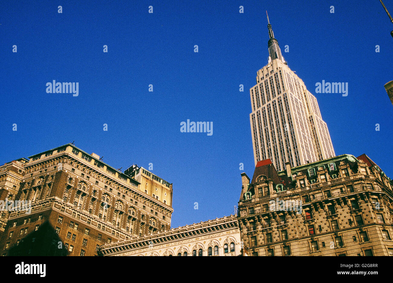 USA - New York. Empire State Building viewed from Herald Square. This cultural icon was designed by William F. Lamb in Art Deco Stock Photo