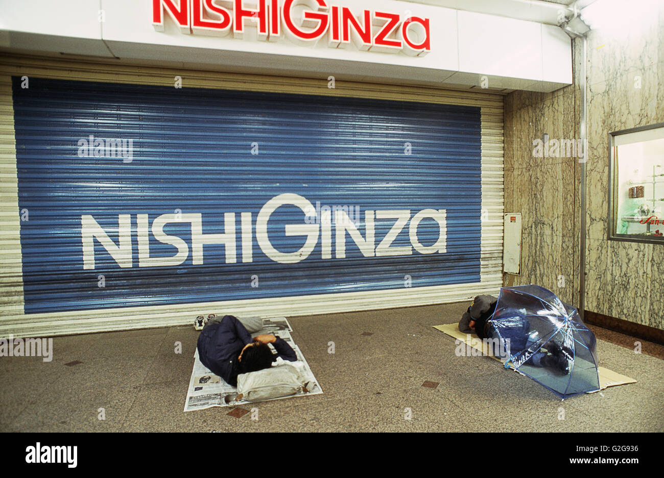 Japan - Tokyo. Homeless men at Ginza Stock Photo