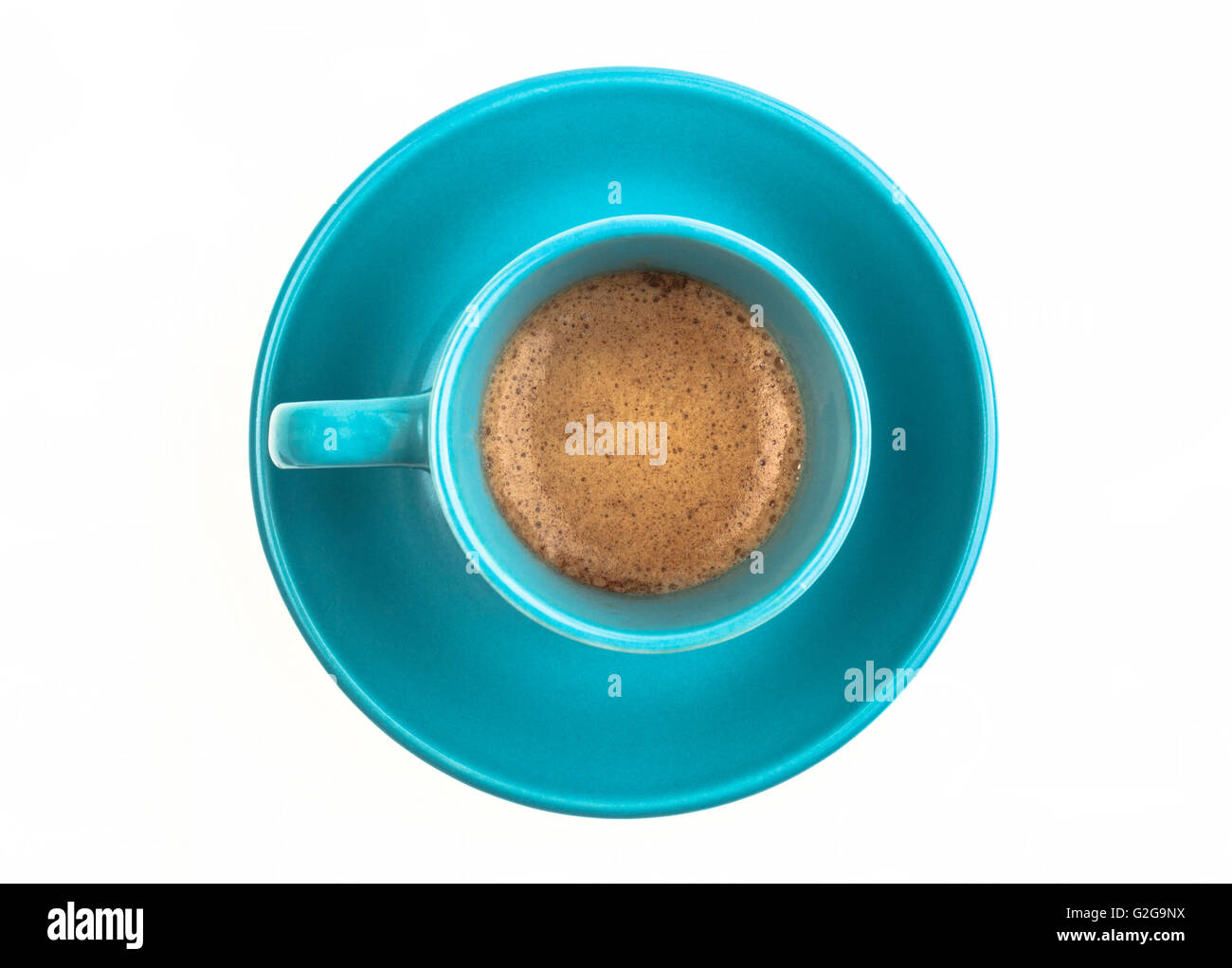 Espresso with foam in a light blue cup isolated on white background Stock Photo