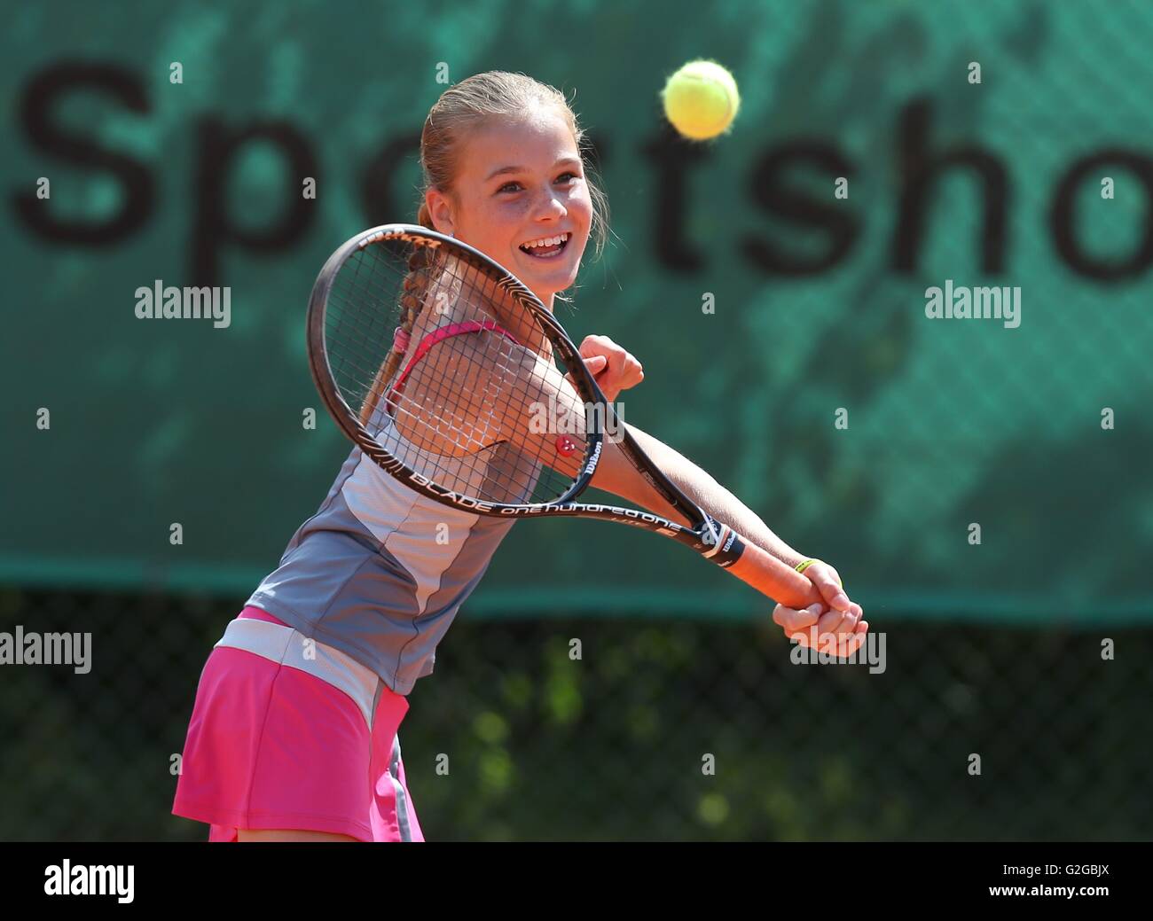 Girl, 11, playing tennis, hitting a forehand volley, Munich, Upper Bavaria, Bavaria, Germany Stock Photo