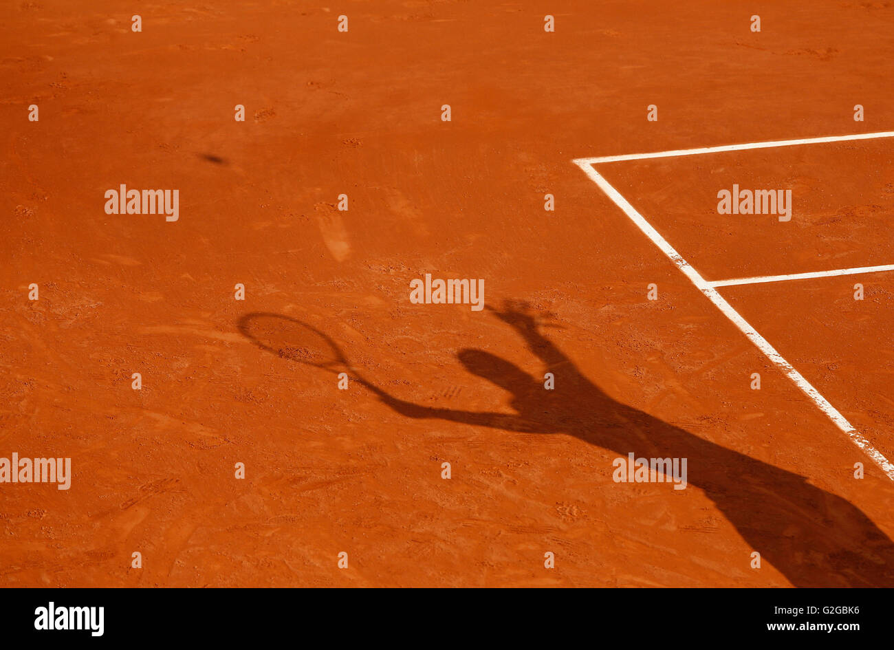 Shadow of a tennis player serving the ball, French Open 2013, ITF Grand Slam Tennis Tournament, Roland Garros Stock Photo