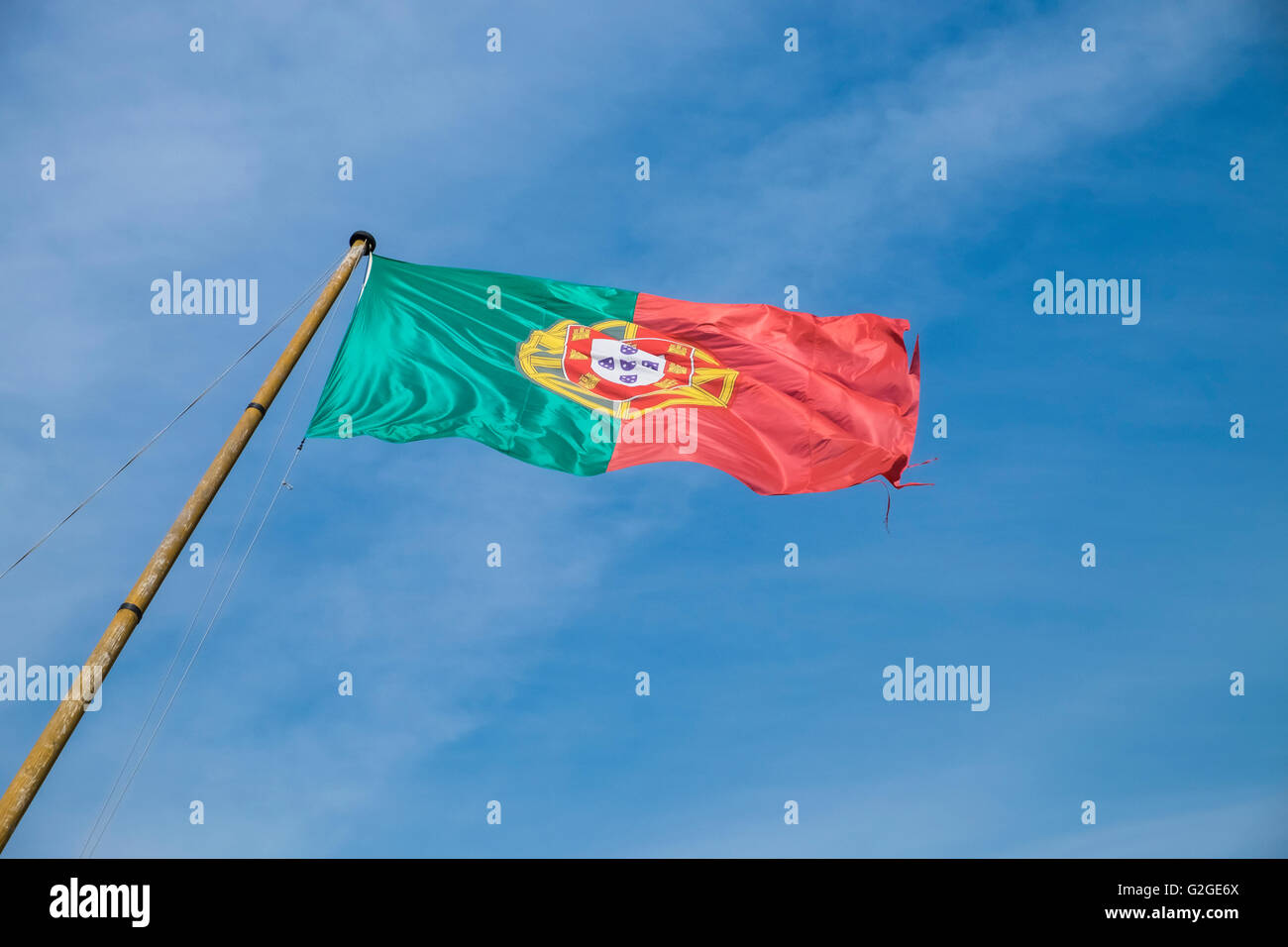 The flag of Portugal, the national flag of the Portuguese Republic. Stock Photo