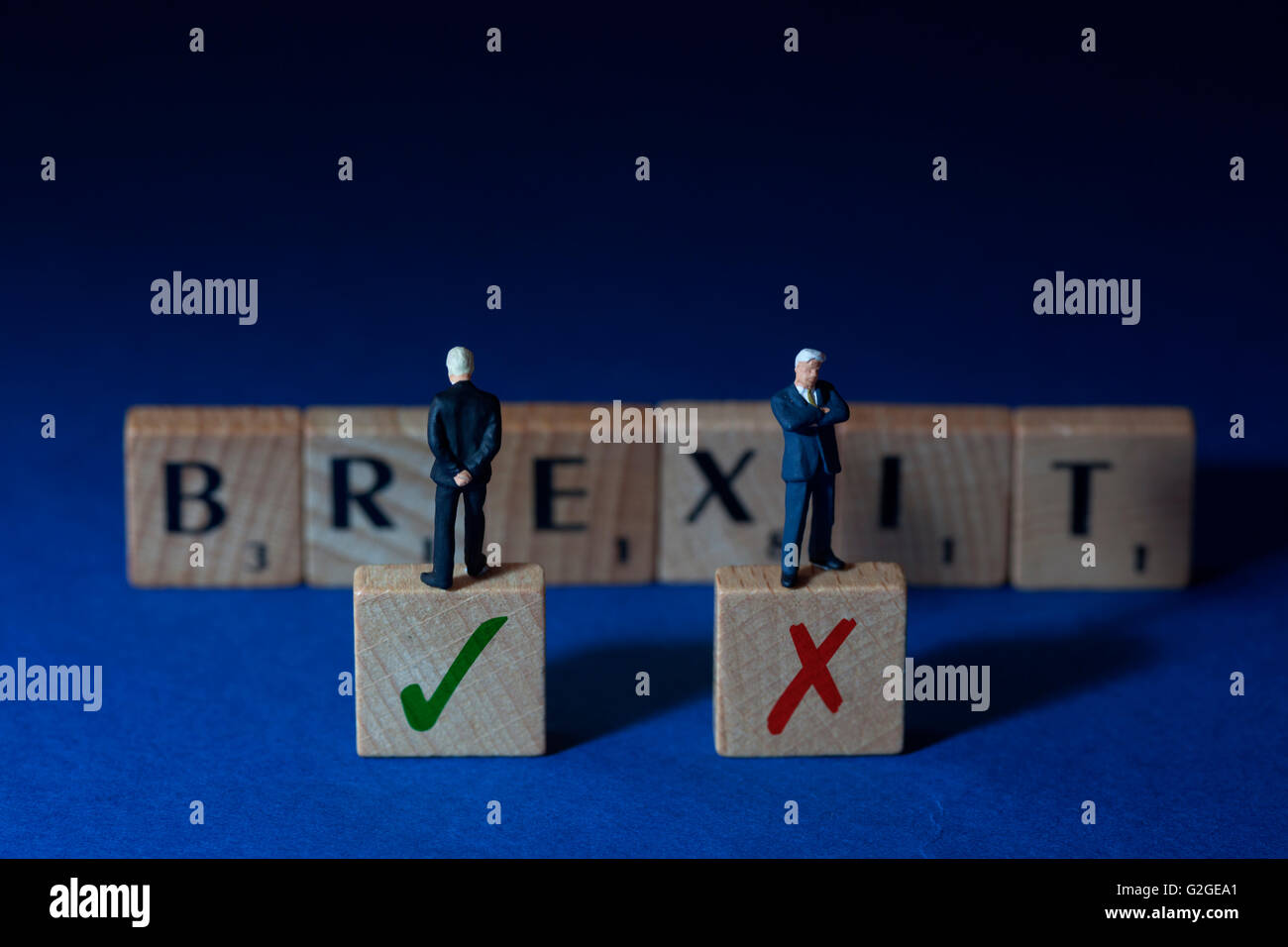 Brexit spelled out with undecided businessman Stock Photo