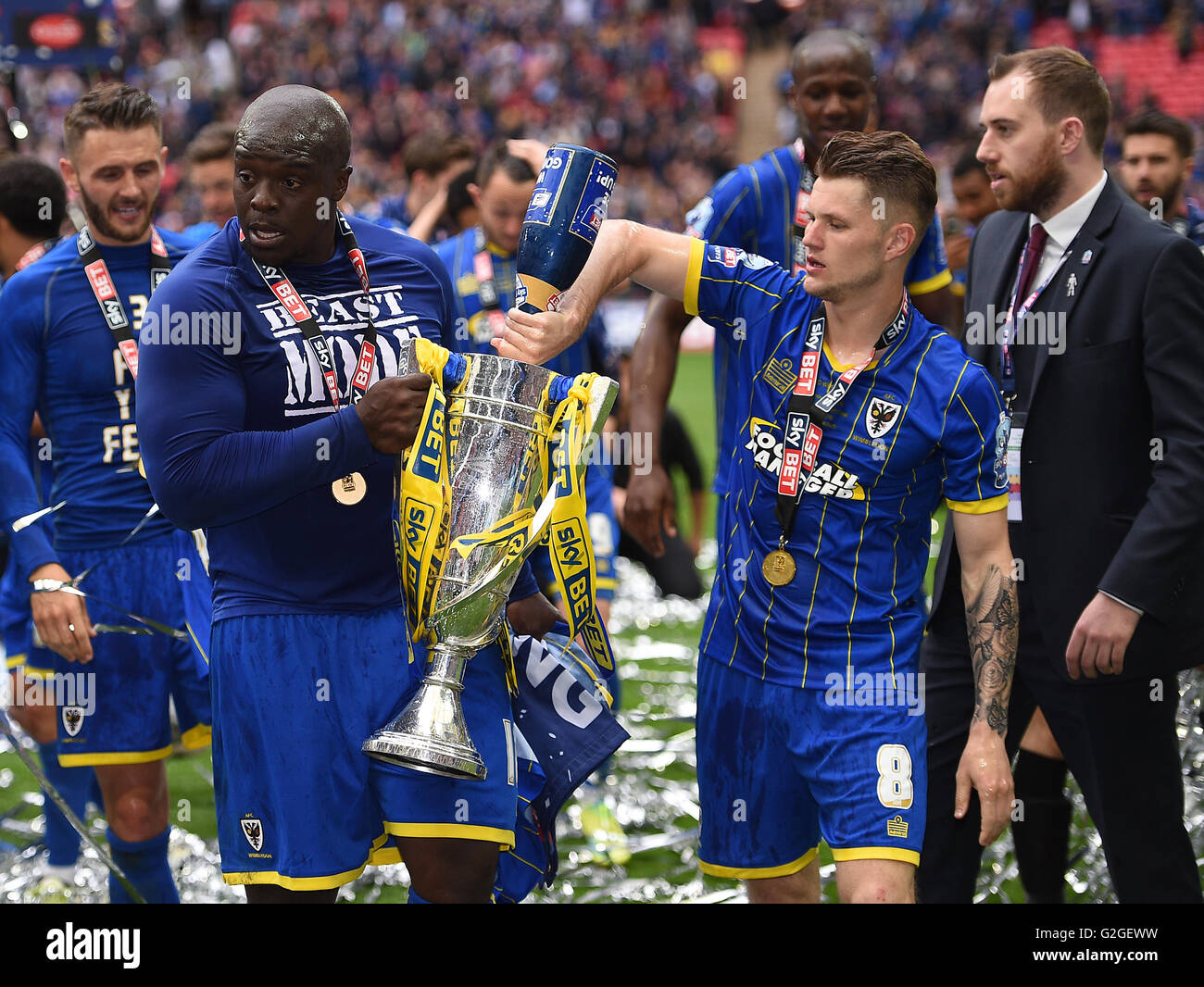 AFC Wimbledon's Adebayo Akinfenwa (left) and Jake Reeves with the Sky ...