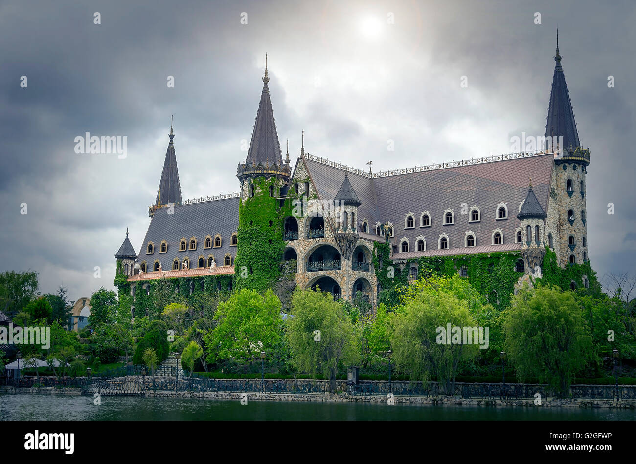 Castle in bad weather against the sky with clouds. Stock Photo